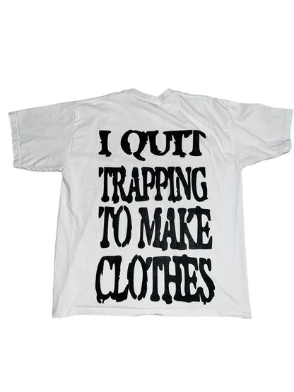 QUIT TRAPPING TO MAKE CLOTHES “white”